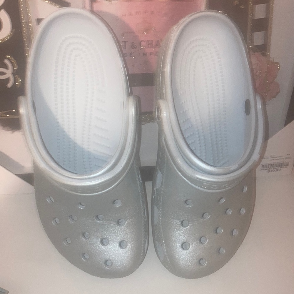 Pearlized baby blue crocs